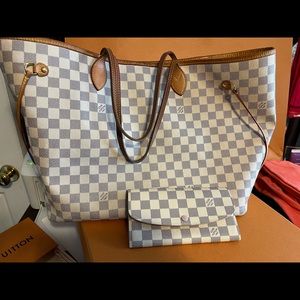 Authentic Louis Vuitton Neverfull GM with matching Emilie wallet.